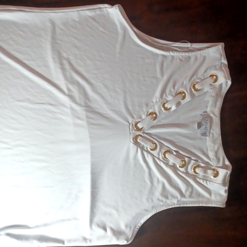 A white and gold Carmen shirt